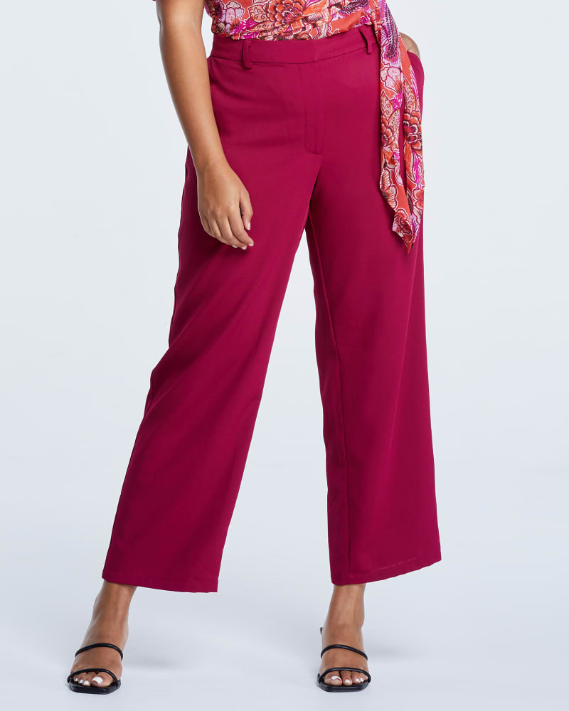 Front of a model wearing a size 2X Granada Pant in Pink by Estelle. | dia_product_style_image_id:264573